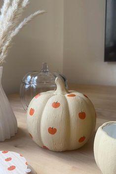 pumpkins and other decorative items on a table