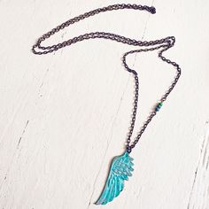 Named after the greek goddess of protection - the Soteria necklace offers a simple, long, bohemian style that looks great either on it's own, or layered! This hippie, boho piece fits perfectly into your summer accessories wardrobe, and is great for that festival chic style! Channel protection with Soteria, a hand-painted winged pendant named after the Greek goddess herself. This simple, long necklace design gives you that boho-chic style that looks as good on its own as it does layered along wit Bohemian Summer Pendant Necklace, Summer Bohemian Pendant Necklace, Bohemian Pendant Necklaces With Oxidized Finish, Bohemian Pendant Necklace With Oxidized Finish, Bohemian Turquoise Charm Necklaces, Bohemian Turquoise Charm Necklace, Goddess Of Protection, Simple Long Necklace, Accessories Wardrobe