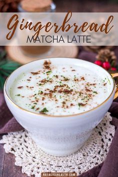 a cup of gingerbread matcha latte with cinnamon sprinkles on top