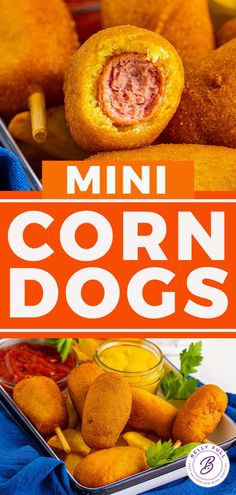 mini corn dogs with ketchup and mustard on the side