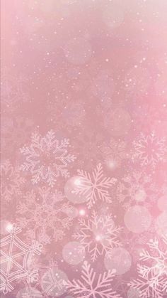 snowflakes on a pink and white background with sparkles in the air,