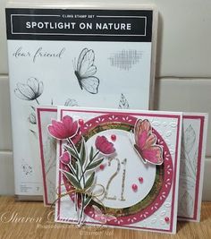 some cards with flowers and butterflies on them