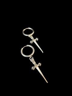 Gothic stainless steel hoop sword earrings. Charms are zinc alloy, hoops stainless steel. Metal Hoop Earrings For Streetwear, Silver Hoop Jewelry For Streetwear, Pierced Hoop Jewelry For Streetwear, Silver Hoop Earrings For Streetwear, Punk Stainless Steel Hoop Jewelry, Punk Style Silver Stainless Steel Hoop Earrings, Silver Stainless Steel Punk Hoop Earrings, Infinite Jewelry, Earrings Gothic