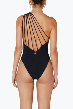 An icon of the season, the Louise One Piece features a one shoulder design with cut out details under the bust for an elegant yet sexy style with gold chain details to add extra class. The back features multiple cross over straps details that fan across the back creating a masterpiece. Italian Eco Lycra 72% Microfibre 28% Elastane (LYCRA®) Open cross over front Asymmetrical cut out details Gold chain details Petite Leggings, One Piece Black, Asymmetrical Cut, Black Room, Medieval Fashion, Black Swimwear, Small Room, Italian Fabric, Independent Designers Fashion