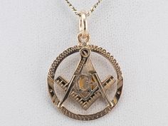 Wonderful details in the gold make this Masonic pendant an outstanding piece of workmanship. The condition is also excellent, and this piece will be a treasured favorite for years to come. This pendant does not come with the chain shown. Please feel free to contact us, we will help you find the perfect chain for your style and budget! Metal: 14K Yellow Gold Measures: 21 x 30 mm, with bail Gold Plated Pendant Custom Necklace, Antique Diamond Cut Pendant Necklace, Formal Hallmarked Pendant Jewelry, Symbolic 14k Gold Medallion Jewelry, Engraved Yellow Gold Oval Pendant Jewelry, Engraved Yellow Gold Oval Pendant, Timeless 14k Gold Square Pendant Jewelry, 14k Gold Jewelry With Oval Pendant, Custom Gold Pendant Necklace In Fine Jewelry Style