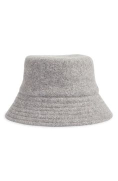 A warm wool blend provide lasting coziness in this classic bucket hat designed to enhance your cold-weather look. 90% wool, 10% nylon Dry clean Imported Classic Winter Bucket Hat With Short Brim, Casual Wool Bucket Hat With Curved Brim, Casual Wool Cloche Hat For Winter, Gray Winter Cloche Hat With Curved Brim, Casual Adjustable Wool Cloche Hat, Casual Wool Felt Hat For Fall, Casual Wool Cloche Hat With Short Brim, Casual Wool Bucket Hat, Trendy Wool Winter Hat