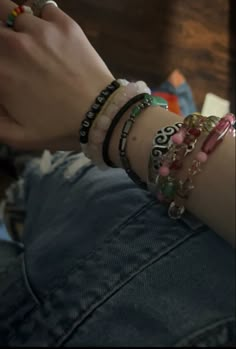 Leather Bracelets Aesthetic, Lots Of Bracelets On Wrist Grunge, Alt Bracelets Aesthetic, Wristbands Aesthetic, Downtown Girl Bracelets, Skater Girl Jewelry, Layered Bracelets Aesthetic, Skater Bracelets, Alternative Bracelets