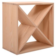 a wooden shelf with two intersecting sections