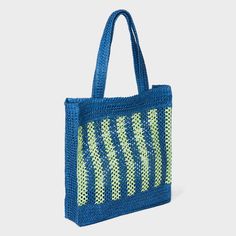 Hold your daily essentials in style with this Stripe Straw Crochet Tote Handbag from A New Day™. This fashionable tote handbag features an unstructured silhouette that's decorated with woven-texture crochet detailing with yellow and light beige stripes. The single main compartment helps keep your cellphone, wallet and more in one spot, while the double handle makes it easy to carry in hand or on your shoulder. Universal Thread™: Found exclusively at Target. Blue Rectangular Crochet Bag For Spring, Blue Summer Bag With Top Carry Handle, Blue Beach Bag For Everyday Use In Spring, Blue Large Capacity Beach Bag For Spring, Blue Everyday Beach Bag For Spring, Blue Rectangular Beach Bag For Spring, Blue Double Handle Summer Bags, Blue Crochet Bag For Everyday Spring Use, Blue Beach Bag For Everyday Spring Use