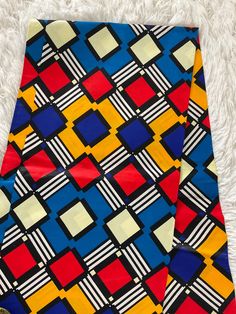 This Multicolor African Fabric is high quality African print made from 100% cotton and it's 45 inches wide. It is used for making African Clothing, African quilts, & For Home decoration. FYI: Print is Double sided. The listing is for 1, 6 yards and Headwrap Each piece of fabric measures:  36in by 45in for 1 yard 216in by 45in for 6 yards 70in by 22in for Head wrap If you purchase more than one yard, you will receive one continuous piece. *If you require more than what I have listed, feel free to Printed Multicolor Ankara Fabric, Traditional Printed Multicolor Fabric, Multicolor Printed Ankara Fabric, Ankara Fabric With Geometric Pattern Prints, Ankara Fabric With Multicolor Print, Colorful Multicolor Ankara Fabric With Pattern, Traditional Multicolor Printed Art, Traditional Patterned And Printed Fabric, Multicolor Print Fabric