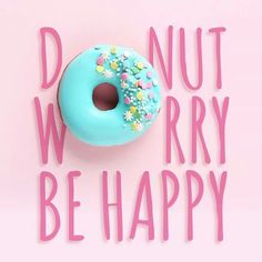 a donut with sprinkles on it and the words do not worry be happy