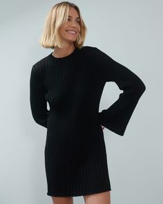 The Knotty Ones Aušra: Black Cotton Mini Dress Organic Cotton Mini Dress The Knotty Ones Fitted Textured Knit Dress With V-neck, Stretch Knit Mini Dress Knee-length, Recycled Outdoor Furniture, Knitted Stretch V-neck Dresses, Black A-line Stretch Mini Dress, Black Knit V-neck Sweater Dress, Beautiful Lingerie, Vegan Shoes, Feminine Look