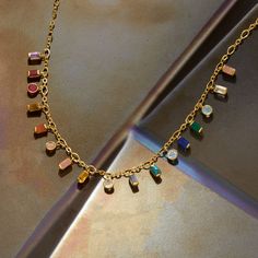 Ross-Simons - 1.90ct t. w. Multi-Gemstone Drop Necklace Over Sterling. 18". Draping the neckline in a colorful gradient of gems, this necklace is certainly a sweet treat. Features drops of 1.90 ct. tot. gem wt. emerald-cut and round garnet, citrine, sky blue topaz, amethyst, rock crystal and blue, pink and white quartz with 4mm and 3x5mm carnelian, peach moonstone, green chalcedony, stabilized turquoise, blue onyx, labradorite and tiger eye. 18kt yellow gold over sterling silver cable chain with Multicolor Gemstone Dangle Necklaces, Multicolor Gemstone Dangle Necklace, Amethyst Rock, Garnet Birthstone, Colorful Gradient, Blue Onyx, Green Chalcedony, Boot Jewelry, Sky Blue Topaz