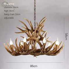 the antler chandelier is made from wood and has five lights on each side