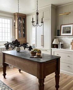 a large kitchen island in the middle of a room