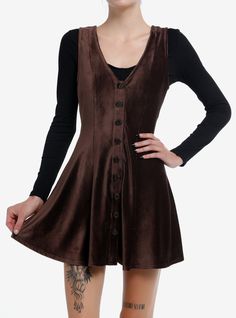 Make room for the cozy cottage dress of your dreams! This brown corduroy dress has a V-neckline and features buttons down the front. Perfect for layering over a cozy long-sleeve! Shirt not included.95% polyester; 5% spandexWash cold; dry lowStretchy materialLength: 33''ImportedListed in junior sizesModel is 5'10''Model wears size Small Brown Flannel Dress, Fall Curdoroy Dress, Fall Dress With Tights Mini, Dresses W Long Sleeves Under, Short Brown Corduroy Dress, Black And Brown Checkered Dress, Long Sleeve Coduroy Dress, Courdory Mini Dress, Hot Topic Mushroom Dress