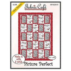 a red and white quilt with the words fabric cafe on it