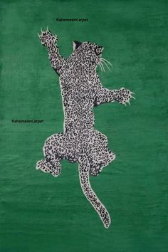 a drawing of a cat with its paws in the air, on a green background