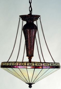 a chandelier hanging from the ceiling with chain around it and a glass shade