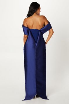 This elegant gown features a draped crepe bodice and a pleated bodice, creating a flattering silhouette. With its maxi length and Bardot neckline, it exudes sophistication and style. Perfect for black tie events, black tie weddings, or even a glamorous collage ball, this dress is sure to make a statement. The statement detail bodice and pencil skirt creates a flattering silhouette. This dress fastens with a centre back fastening ? Draped Gown, Black Tie Events, Drape Gowns, Drape Maxi Dress, Bardot Neckline, Dress Drape, Petite Jumpsuit, Occasion Dresses Wedding, Bardot Dress