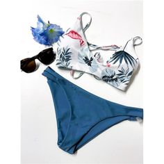 Embrace The Ultimate Beach Vibe With This Trendy And Stylish Two-Piece Swimsuit Set. The Top Features A Classic Triangle Style With Delicate Spaghetti Straps And Lace Accents, While The Bottom Is A Flattering Bikini Style That Will Enhance Your Figure. The Swimsuit Comes In A Solid Color And Is Made From High-Quality Polyester Material, Ensuring Both Comfort And Durability. Whether You&Apos;Re Hitting The Beach Or Lounging By The Pool, This Swimsuit Is A Perfect Choice For Any Beach Enthusiast. Blue Tropical Tankini With Triangle Top, Blue Tropical Print Tankini For Sunbathing, Blue Tropical Print Tankini For Beach Party, Blue Stretch Tropical Print Swimwear, Blue Lined Tankini For Beach Season, Blue Stretch Tropical Swimwear, Tropical Blue One-piece Swimwear, Blue Tropical Swimwear With Lined Body, Blue Tropical Style Swimwear With Lined Body