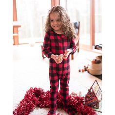 As the holidays and other special occasions come closer, it’s a great time for wearers to style in the Footed Cotton Pajamas. With many designs to choose from like plaid and stripes, your little one will look amazing while receiving the best comfort. These outfits implement footed grips that keep wearers secure for those colder nights and playdates. The cotton material easily complements the convenient tagless labels, which prevent tag scratches on exposed skin. To keep wearers safe from possibl Christmas Pajamas Plaid, Pajamas Plaid, Buffalo Check Christmas, Footed Pajamas, Plaid Baby, Cotton Pajamas, Footie Pajama, Plaid Pajamas, One Piece Pajamas