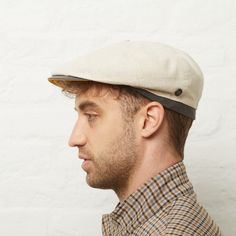 Introducing the Logan Raggie Natural Linen Italian Flat Cap for Men, a quintessential accessory for the discerning gentleman's summer wardrobe.   Meticulously crafted in Italy, this cap embodies timeless elegance with a contemporary twist. Its composition of 55% cotton, 32% linen, and 3% spandex strikes the perfect balance between comfort and style, ideal for balmy days.   Whether exploring the city streets or enjoying a leisurely afternoon outdoors, the Logan Raggie Natural Linen Italian Flat Cap exudes effortless sophistication and refined charm. If the cap becomes soiled, avoid hand or machine washing. Instead, we recommend taking it to a professional dry cleaner for proper care. Request dry cleaning to ensure the cap retains its quality and shape, preserving its pristine appearance for Sporty Outdoor Flat Cap, Summer Linen Flat Cap, Outdoor Flat Cap Hat, One Size Fits Most, Classic Beige Flat Cap, Military Style Cotton Flat Cap, Flat Cap Men, Hat Base, Central Saint Martins, Flat Cap