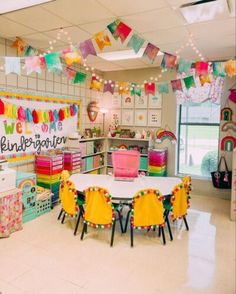 a classroom with tables, chairs and decorations