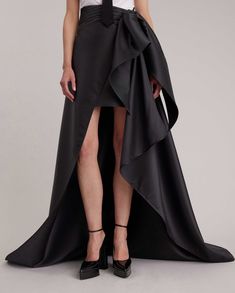 Pre-draped Asymmetrical Skirt For Evening, Formal Pre-draped Flowy Skirt, Formal Draped Flowy Skirt, Elegant Black Draped Bottoms, Elegant Draped Flowy Skirt, Elegant Draped Evening Maxi Skirt, Elegant Draped Maxi Skirt For Evening, Fitted Draped Bottoms For Evening, Voluminous Asymmetrical Maxi Skirt For Evening