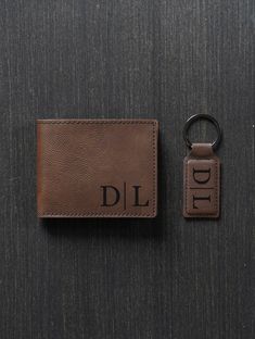 a brown leather keychain with the word dil on it