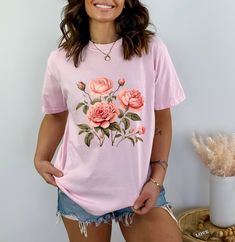 Rose TShirt, Pink Rose T-shirt, Flower Top, Garden Shirt, Vintage Rose T-shirt, Botanical Shirt, Rose Tee, Comfort Colors T-shirt Introducing the Comfort Colors 1717 T-Shirt - Where Comfort Meets Customizability! Elevate Your Style: Discover the epitome of comfort and individuality with the Comfort Colors 1717 T-Shirt. Unveil a world of possibilities with this fully customizable tee that's designed to reflect your unique taste. Crafted with meticulous care, this tee is a testament to quality and Cheap Cotton T-shirt With Rose Print, Cheap Pink T-shirt With Rose Print, Affordable Pink Rose Print T-shirt, Rose Comfort, Rose Tshirt, Garden Shirt, Botanical Shirt, Rose T Shirt, Flower Top