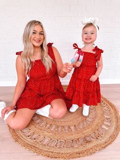 Get ready for the 4th of July in style with these adorable mommy and me dresses. Made of comfy materials, they come in bright red with a white dot pattern, adjustable straps, and a flowy skirt that flatters both mom and child. The cute bow accent at the shoulders adds a touch of charm to these matching dresses. I T E M D E S C R I P T I O N  *  Fit Type: True to Size *  Fabric has no stretch *  Material: 100% Polyester *  Adjustable straps *  Shirred back If you're looking for matching shoes, yo Mommy And Me Outfits Dresses, Mommy And Me Dress, Mom And Child, 4th Of July Dresses, Dresses Holiday, Mommy And Me Dresses, Christmas Matching, Mommy And Me Outfits, Spring Floral Dress