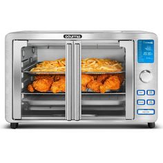 an open toaster oven with two trays of food in it's door