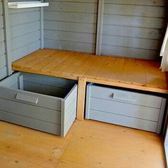 an empty storage room with drawers and shelves