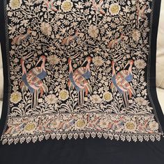 Pashmina Stole With Tilla Work ( Gold Thread Embroidered Work ) What Is Tilla Work ? Kashmiri Tilla Embroidery Is A Highly Skilled And Time-Consuming Process. It Involves The Use Of A Specialized Needle, Which Is Used To Create Intricate Designs On The Fabric. The Metallic Threads, Which Are Often Made Of Gold Or Silver, Are Then Sewn Onto The Fabric, Creating A Raised And Textured Effect. Size: Width: 28 Inches Length: 80 Inches . White Wedding Pashmina Shawl With Motifs, Embroidered Jamawar Pashmina Shawl For Wedding, Wedding Jamawar Pashmina Shawl With Intricate Embroidery, Wedding Pashmina Shawl With Intricate Embroidery, Wedding Traditional Wear With Chikankari Embroidery In Pashmina, Wedding Pashmina With Intricate Embroidery, Wedding Pashmina Traditional Wear With Chikankari Embroidery, Wedding Pashmina Shawl With Multicolor Embroidery, Traditional Embroidered Pashmina Shawl For Wedding