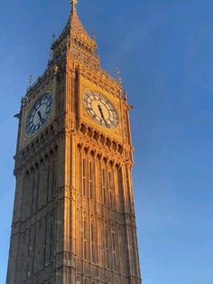 the big ben clock tower towering over the city of london