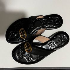 Beautiful Decoration And Can Be Worn In Any Occasion! Excellent Condition, Almost Never Worn! Gucci Designer Sandals With Single Toe Strap, Designer Gucci Sandals With Single Toe Strap, Designer Slip-on Sandals With Branded Insole, Gucci Luxury Sandals With Branded Insole, Gucci Black Sandals With Single Toe Strap, Gucci Leather Flat Sandals, Gucci Luxury Sandals With Cushioned Footbed, Gucci Leather Sandals Flat Heel, Luxury Gucci Sandals With Cushioned Footbed