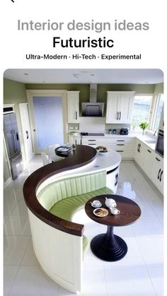 a kitchen with a curved counter top next to a breakfast nook in the center