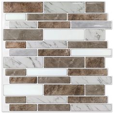 a white and brown tile backsplash with marble tiles on the bottom, in different colors