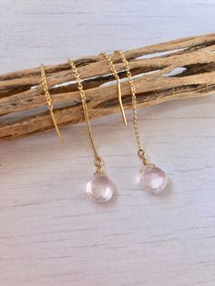 Rose Quartz Threader Earrings, Rose Quartz Modern Earrings, Pink Minimalist Chain Earrings, Dainty Pull Through Earrings, Boho, gift for her Rose Quartz teardrops suspended from 14k gold filled or sterling silver ear threaders. Ideal for a modern look, super clean and minimalistic earrings. Great choice of bridesmaids earrings they can continue to use on a daily basis. Stone Size: 8 mm Stone Shape: Teardrop Earring Length: 35 mm Material: Choice of 14k Gold Filled or Sterling Silver Gift Wrappin Pierced Drop Earrings In Rose Gold, Pink Briolette Earrings As Gift, Pink Briolette Earrings For Gift, Rose Gold Drop Earrings Pierced, Rose Gold Pierced Drop Earrings, Delicate Pink Pierced Earrings, Delicate Long Drop Rose Gold Earrings, Rose Gold Dangle Earrings As Gift For Her, Dainty Rose Gold Long Drop Jewelry