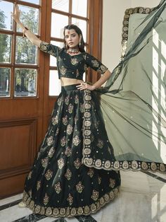 Buy stunning black organza embroidered lehenga choli for celebrating upcoming festival celebration. Shop this impressive lehenga choli which comes with Maslin Cotton blouse and Maslin Cotton dupatta.