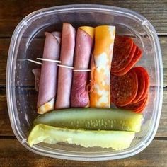 a plastic container filled with different types of food