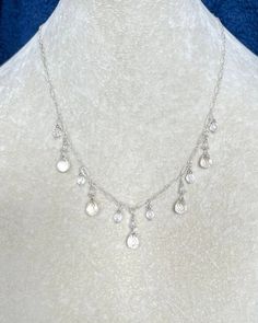 Sparkling Faceted Crystal Quartz Briolettes with White Topaz Faceted Accents and swinging from Sterling Silver Fancy Chain.  Total length is 16 inches with an extension chain to 18 inches. Adjustable Silver Drop Crystal Necklace, Dainty Silver Necklace With Dangling Charms, Topaz Necklace, Wedding Jewellery Necklace, Faceted Crystal, Sparkling Crystal, Crystal Quartz, White Topaz, Wedding Necklace