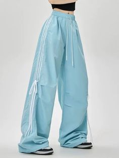 𝔇𝔢𝔱𝔞𝔦𝔩𝔰: Style: Casual, Streetwear, Bloke core Materials: Spandex Quantity: 1 pc These lightweight pants are designed in a pastel color scheme, ideal for the summer season. The ribbon accents add a touch of femininity to this casual piece, perfect for a laid-back yet fashionable outfit. Enjoy free shipping with a purchase of over 80$ SIZE LENGTH WAIST HIPS 39 in 25 in 50 in M 41 in 26 in 51 in L 41 in 27 in 52 in XL 42 in 28 in 53 in Item measured by hands may have 1-2 in differences.SIZE LENGTH WAIST HIPS 102 cm 60 cm 123 cm M 103 cm 64 cm 127 cm L 104 cm 68 cm 131 cm XL 106 cm 72cm 135cm Item measured by hands may have 2-3 cm differences. White Nylon Parachute Pants For Summer, Trendy Stretch Parachute Pants For Summer, Sporty High Waist Parachute Pants For Spring, Sporty Baggy Parachute Pants For Summer, Light Blue Nylon Bottoms For Summer, Summer Stretch Parachute Pants For Streetwear, Sporty Cotton Parachute Pants For Summer, Blue Stretch Parachute Pants For Summer, Summer Nylon Parachute Pants