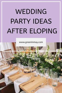 a table set up for a wedding party with white flowers and greenery on top