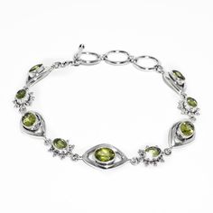 Beautifully handcrafted in solid sterling silver, this sterling silver bracelet features a natural Peridot gemstone. The perfect gift for our loved ones, it's both cute and practical! It is a perfect Christmas or Valentines gift. We Assure Your Satisfaction With Our High-Quality Jewelry * Sterling Silver * Natural Gemstone * Nickel free * Made in India With Love And High Standards ※ Please let us know if you have any questions or requests. Thank you for visiting our shop :) Green Sterling Silver Bracelets, Fine Jewelry, Green Sterling Silver Bracelets Fine Jewelry, Elegant Sterling Silver Bracelets For May Birthstone, Adjustable Peridot Bracelet, Green Sterling Silver Bracelets With Silver Clasp, Elegant Peridot Jewelry With Natural Stones, Certified Green Sterling Silver Bracelets, Sterling Silver Bracelet With Green Gemstone, Spiritual Sterling Silver Bracelet With Polished Finish