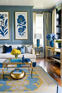 a living room with blue and yellow decor