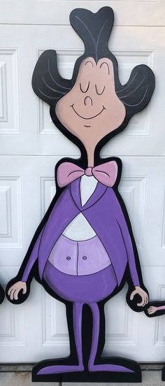 a cartoon character standing in front of a garage door wearing a purple suit and pink bow tie