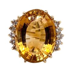 16.9 Carat Retro Gold Cocktail Ring Natural Diamond and Citrine Quartz, circa 1970 Luxury Citrine Rings With Vvs Clarity, Exquisite Oval Citrine Jewelry, Citrine Cocktail Ring, Citrine Jewelry 1stdibs, Luxury Antique Citrine Jewelry, Diamond Dress Ring, Vintage Cocktail Ring, Ruby Diamond Rings, Gold Cocktail Ring