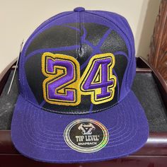 Questions? Leave A Comment Below! Lakers Colors, Kobe Bryant, Los Angeles Lakers, Hat Cap, Snapback Hat, Snapback Hats, Purple And Black, One Size Fits All, Accessories Hats